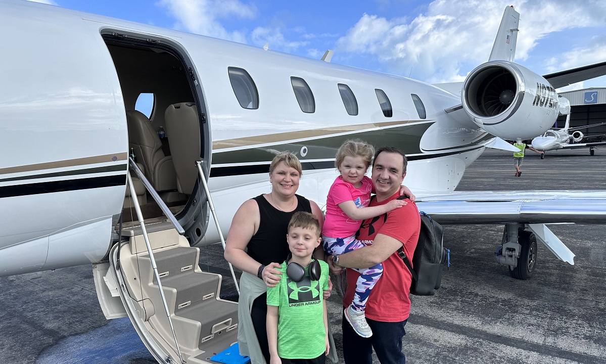Family pic on the jet